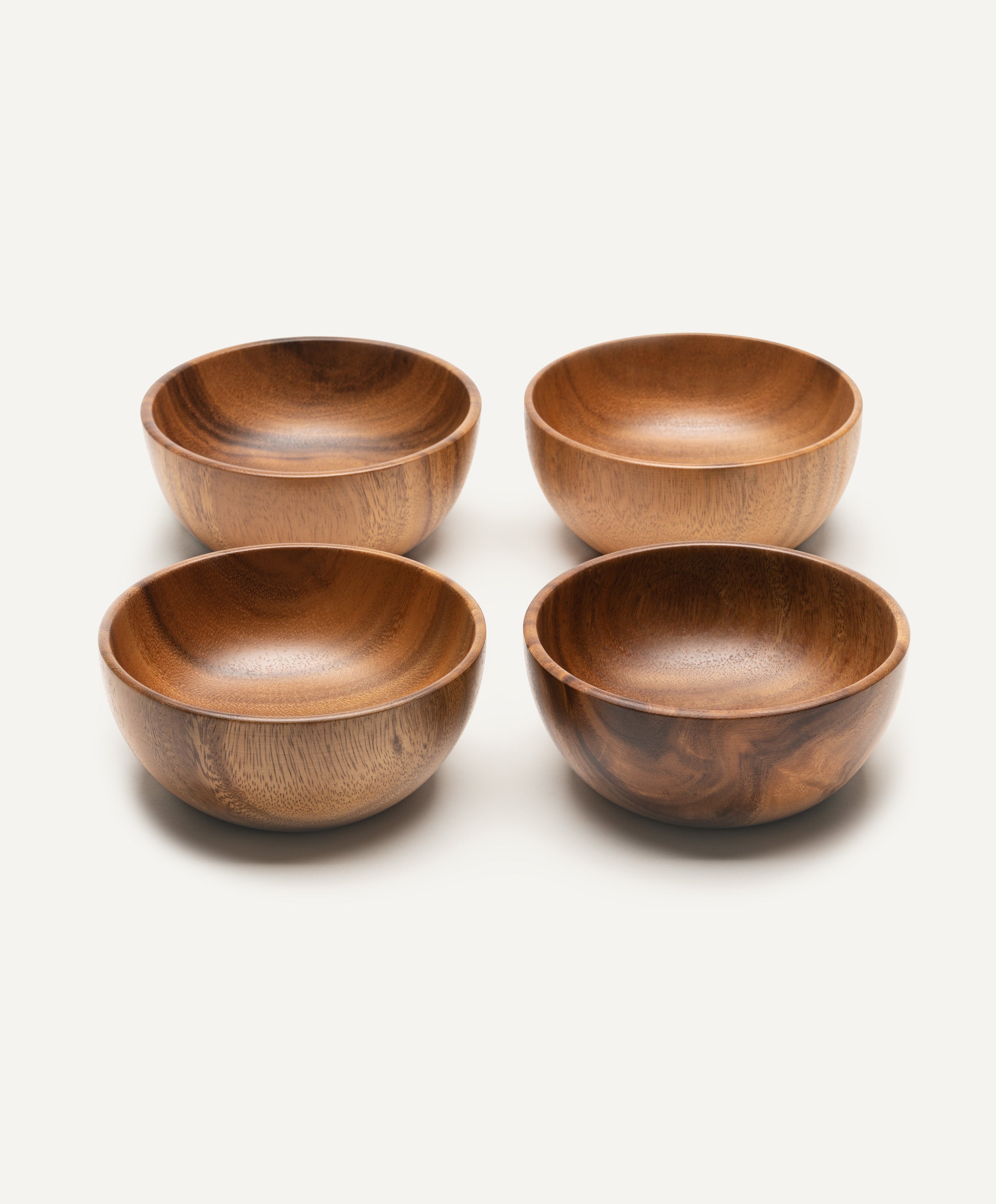 Set of four Foree wooden bowls 6.25 x 2.5 in made from solid Acacia wood, showing natural woodgrain and handcrafted design