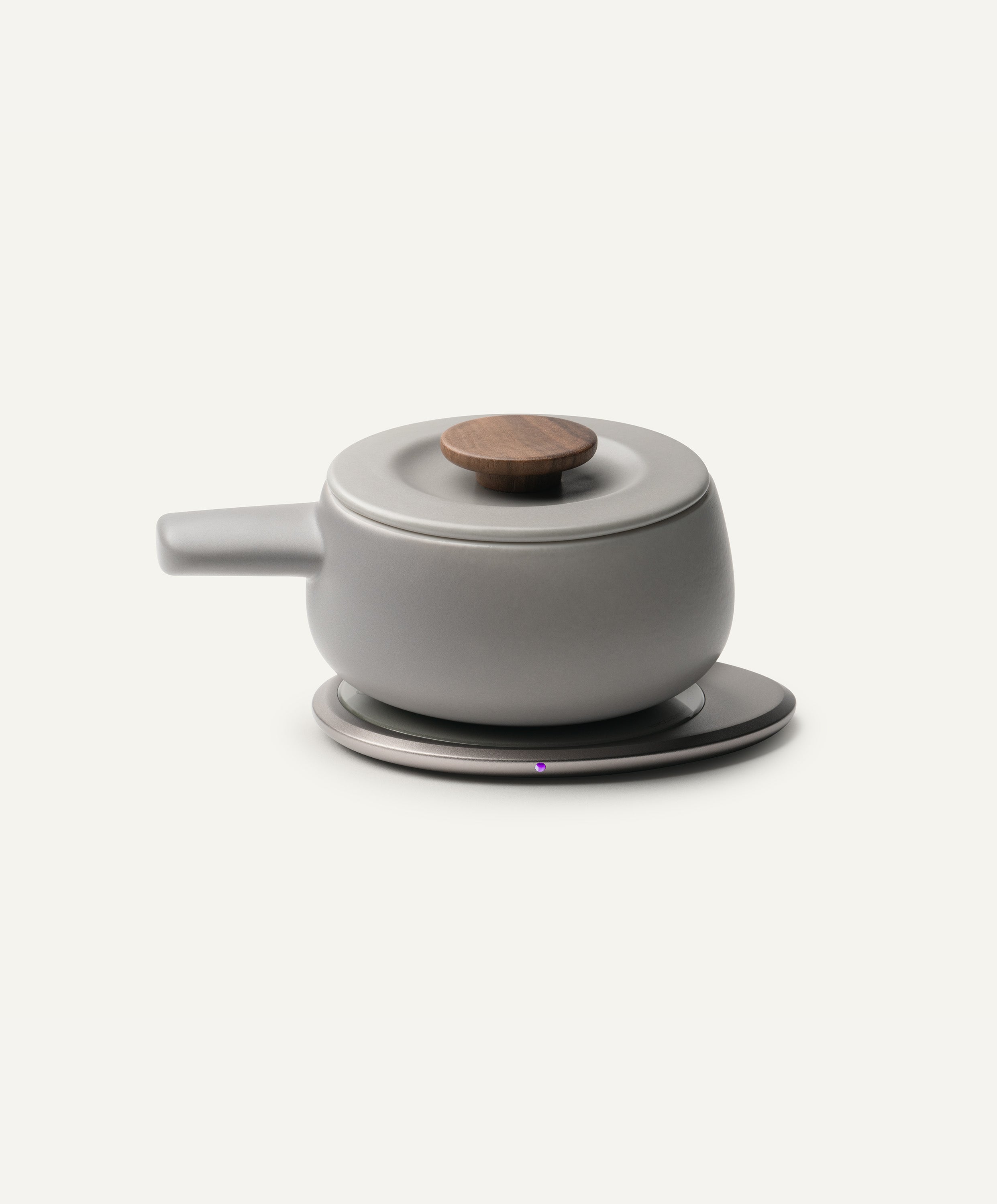 Fondi Self-Heating Ceramic Fondue 7.6 fl oz / 225 mL in Soft Gray on Ohom Charging Pad 3