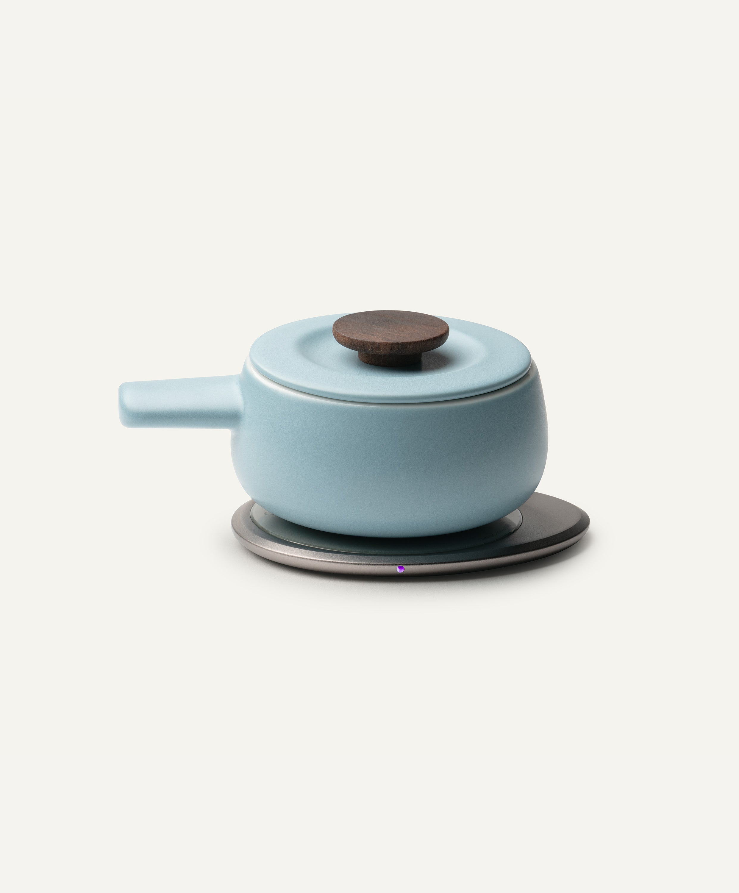 Fondi Self-Heating Ceramic Fondue 7.6 fl oz / 225 mL in Moonmist Blue on Ohom Charging Pad 3