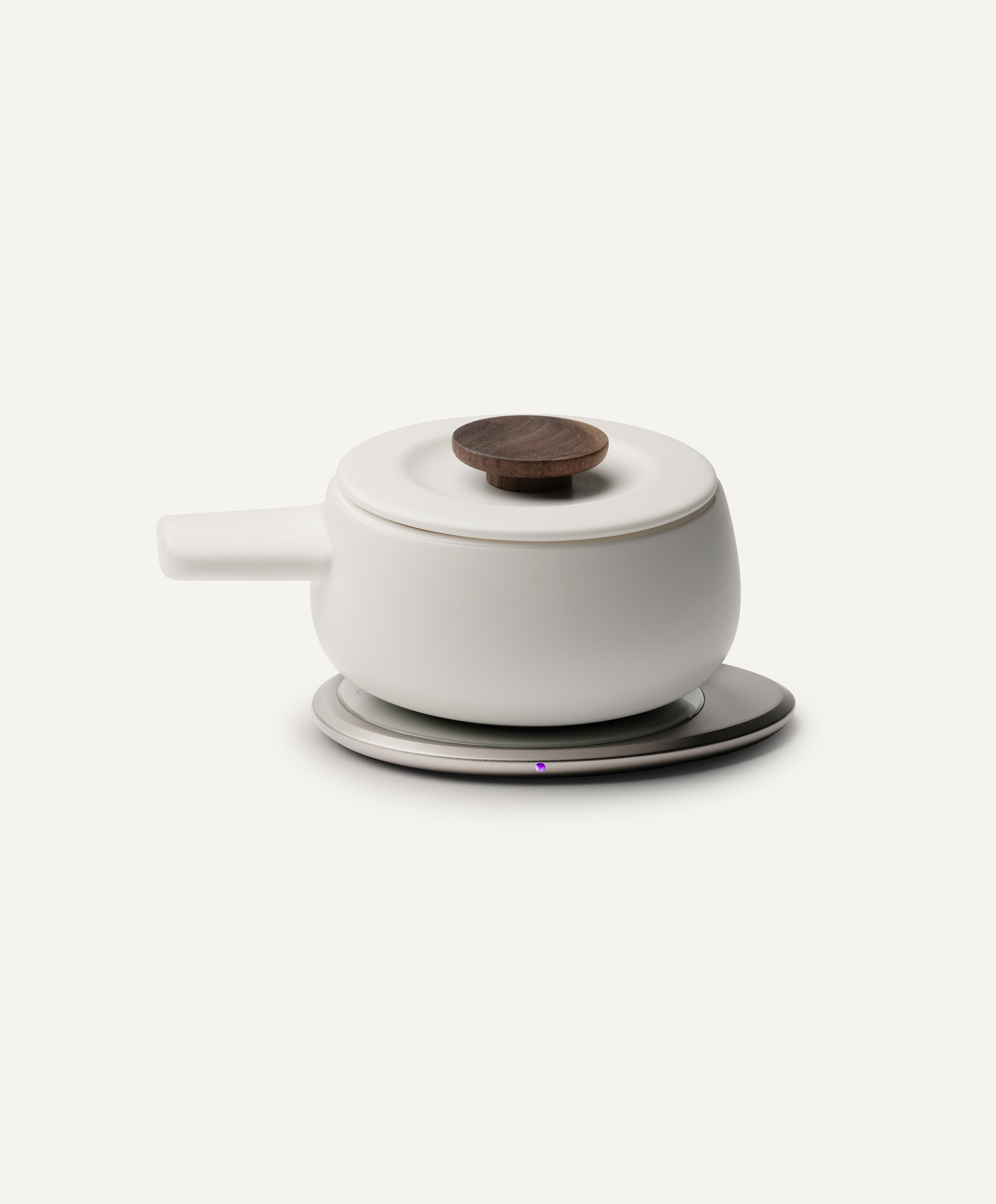 Fondi Self-Heating Ceramic Fondue 7.6 fl oz / 225 mL in Jasmine White on Ohom Charging Pad 3