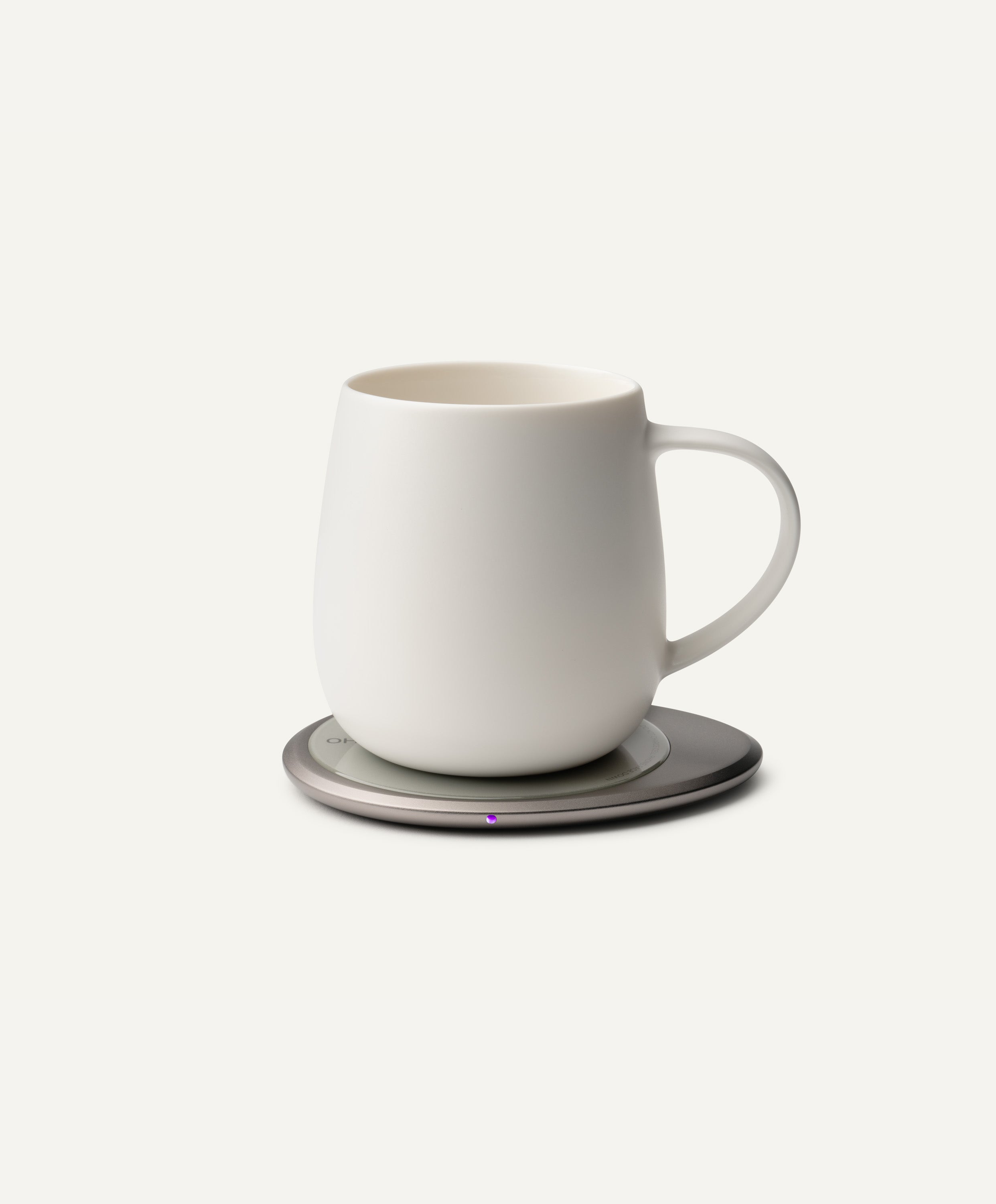 Ui 3 Self-Heating Ceramic Mug 12 fl oz / 355 mL in Jasmine White on Ohom Charging Pad 3
