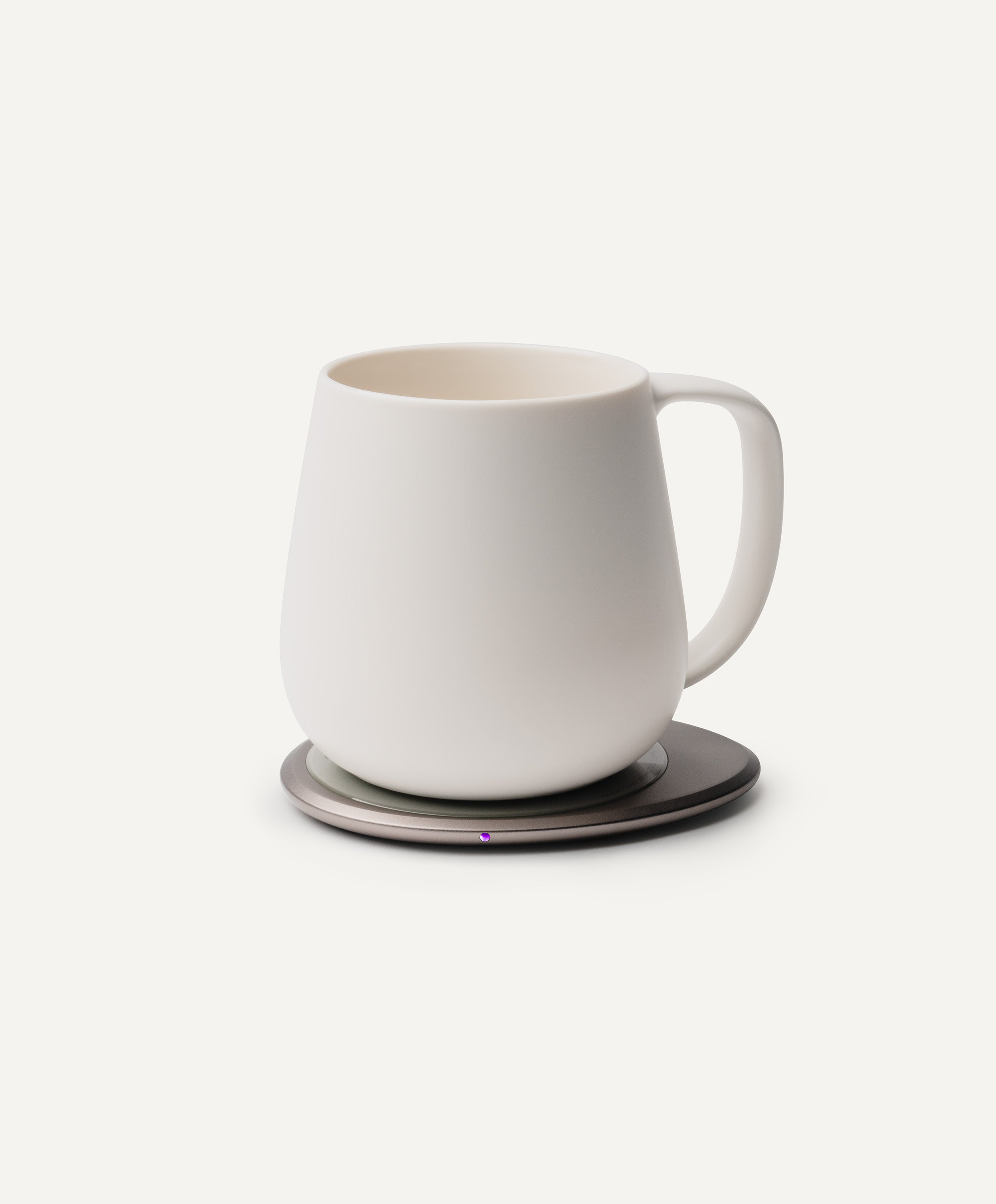 Ui+ Self-Heating Ceramic Mug 18 fl oz / 532 mL in Jasmine White on Ohom Charging Pad 3