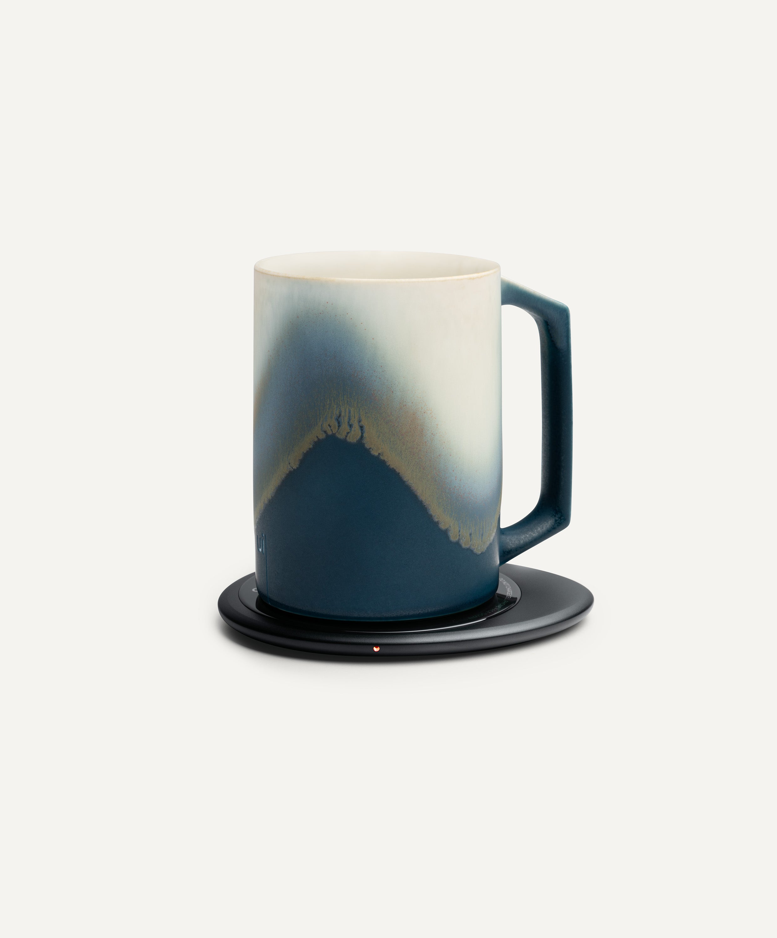 Ui Artist Collection Self-Heating Ceramic Mug 12 fl oz / 355 mL in Arctic Radiance on Ohom Charging Pad 3