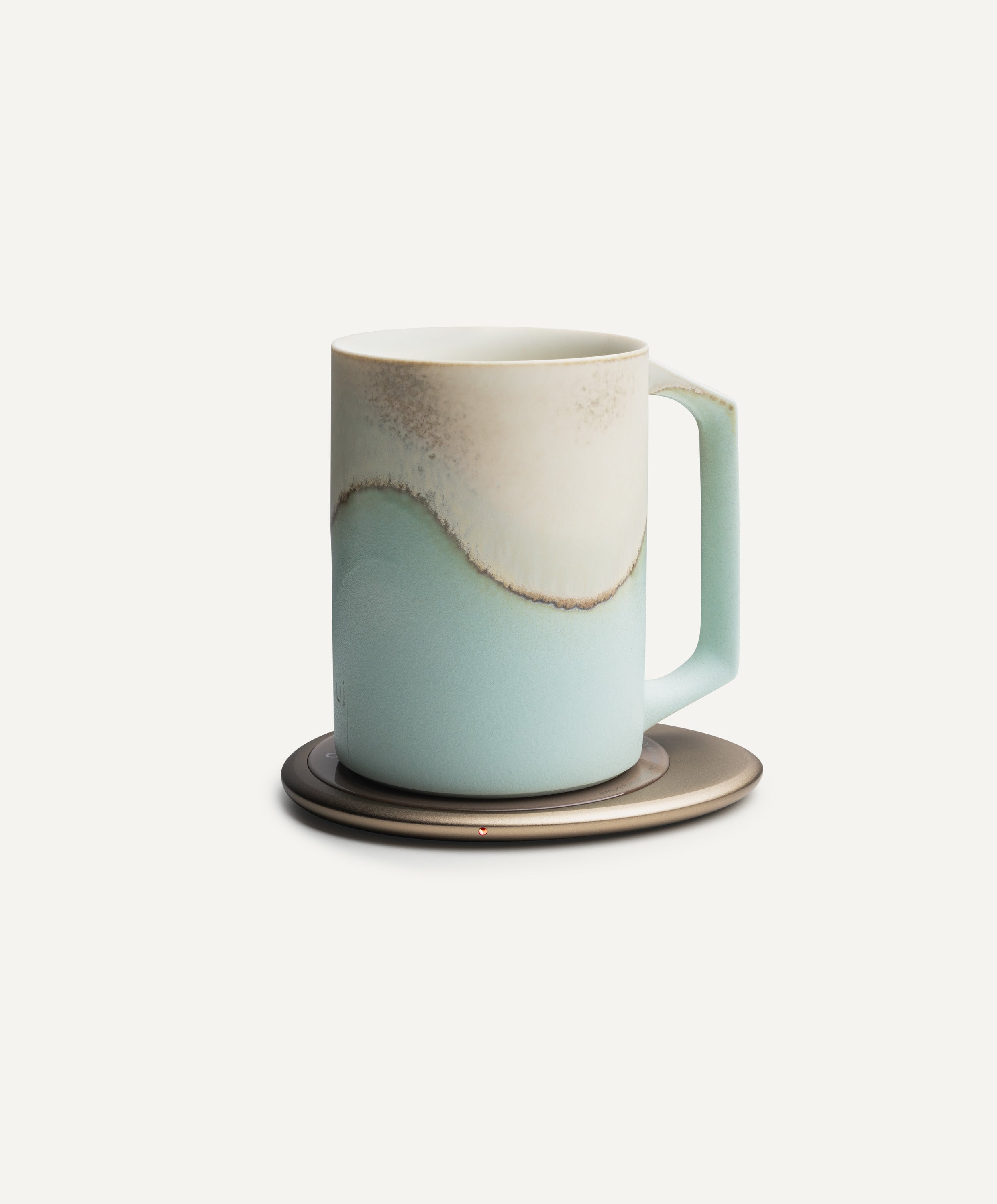 Ui Artist Collection Self-Heating Ceramic Mug 12 fl oz / 355 mL in Mint Glacier on Ohom Charging Pad 3