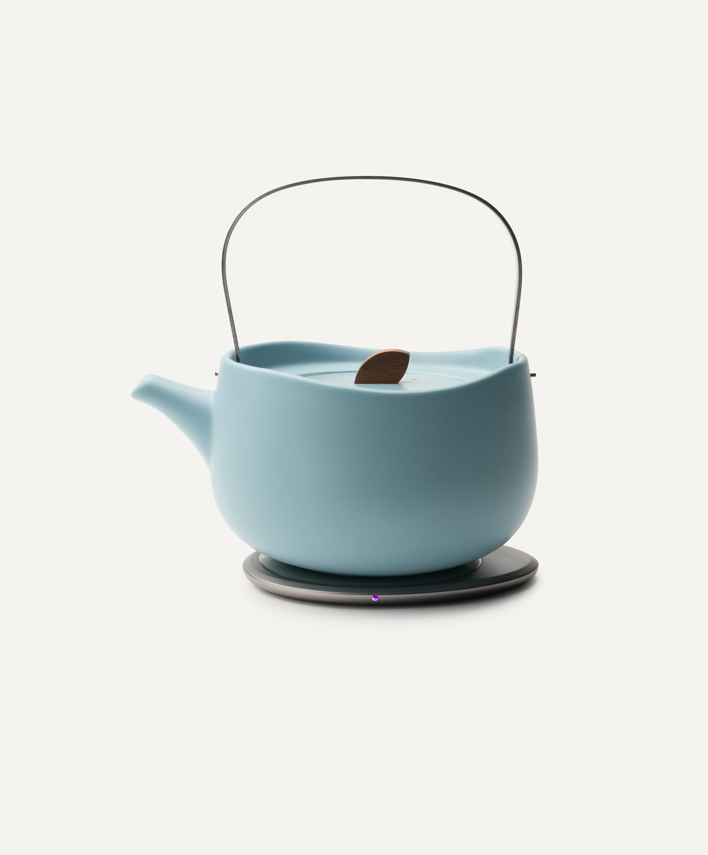 Leiph Self-Heating Ceramic Teapot Set 20 fl oz / 600 mL in Moonmist Blue on Ohom Charging Pad 3