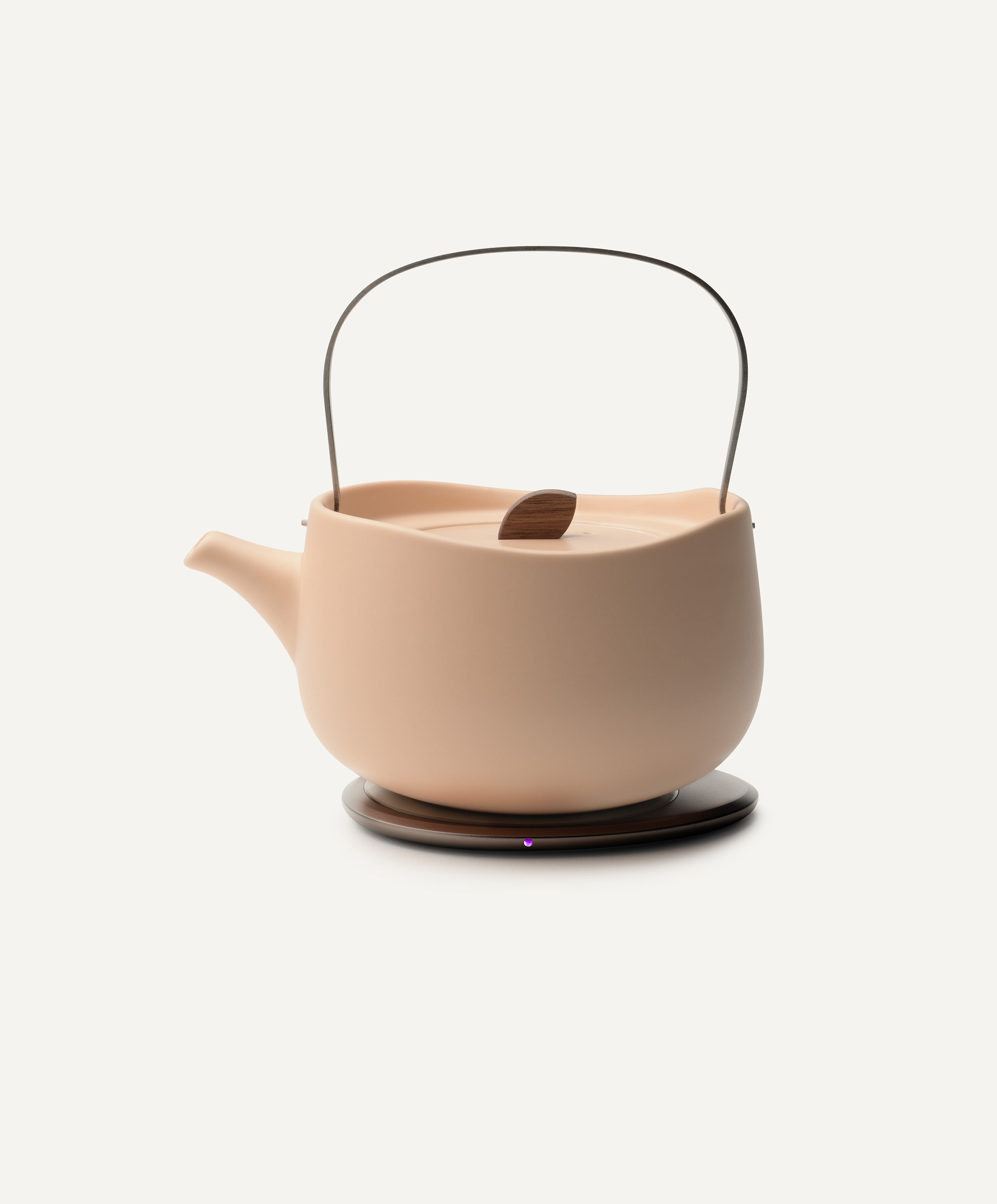 Leiph Self-Heating Ceramic Teapot Set 20 fl oz / 600 mL in Rosy Apricot on Ohom Charging Pad 3