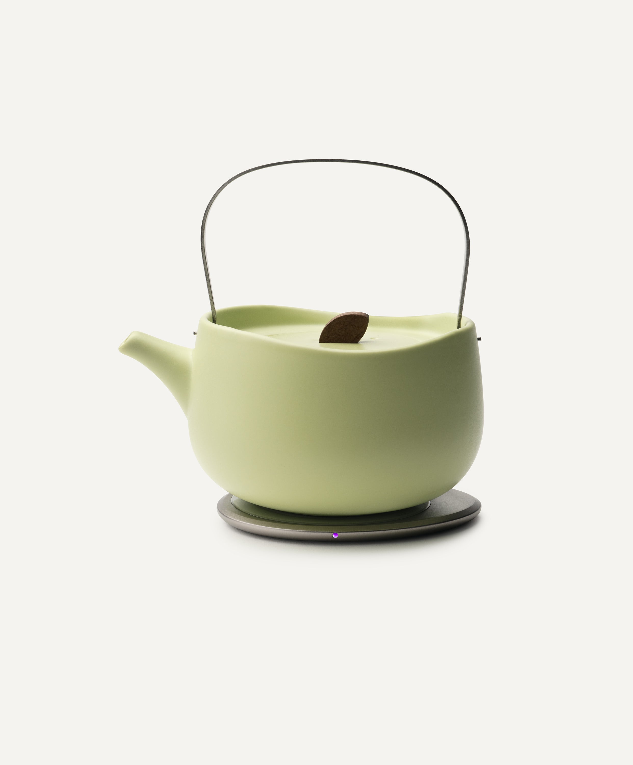 Leiph Self-Heating Ceramic Teapot Set 20 fl oz / 600 mL in Verde Green on Ohom Charging Pad 3