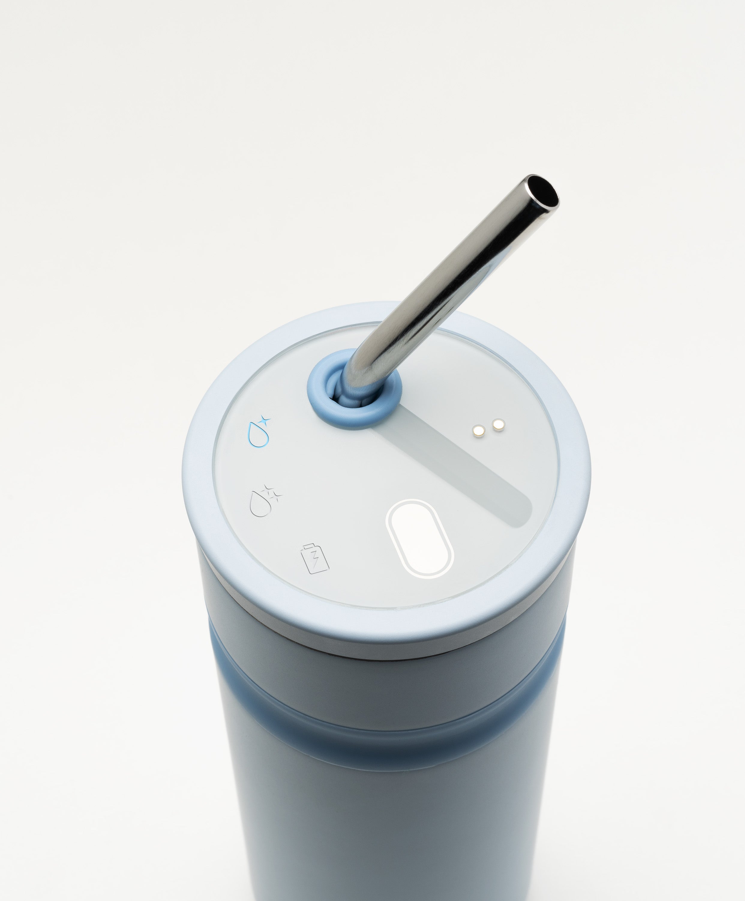 Top view of Uvio self-purifying water bottle 16 fl oz / 480 mL in Polar Blue showing straw, button, and UV-C purification features that eliminate 99.9% of harmful microorganisms