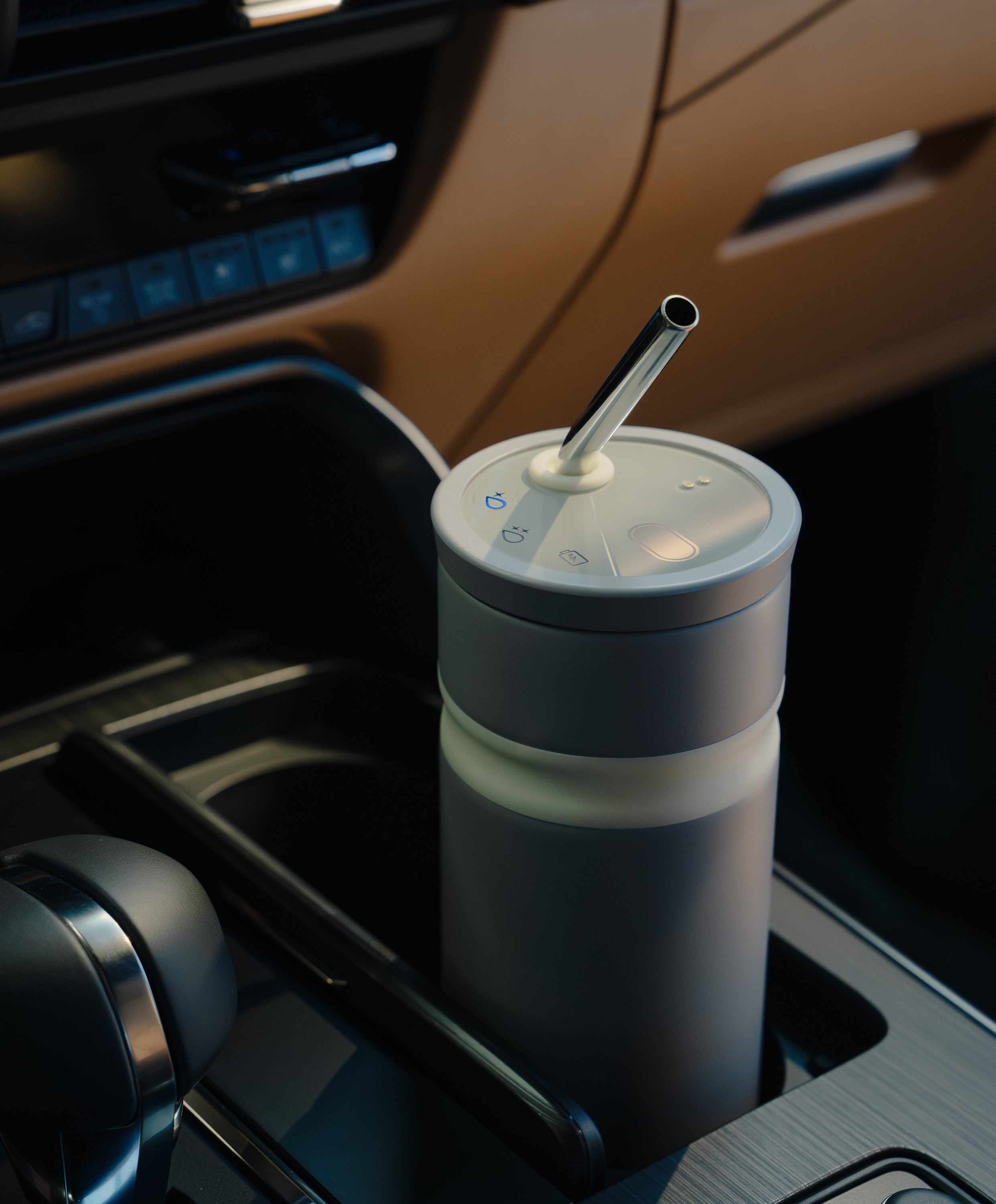 Uvio self-purifying water bottle 16 fl oz / 480 mL in stainless steel placed in car cup holder