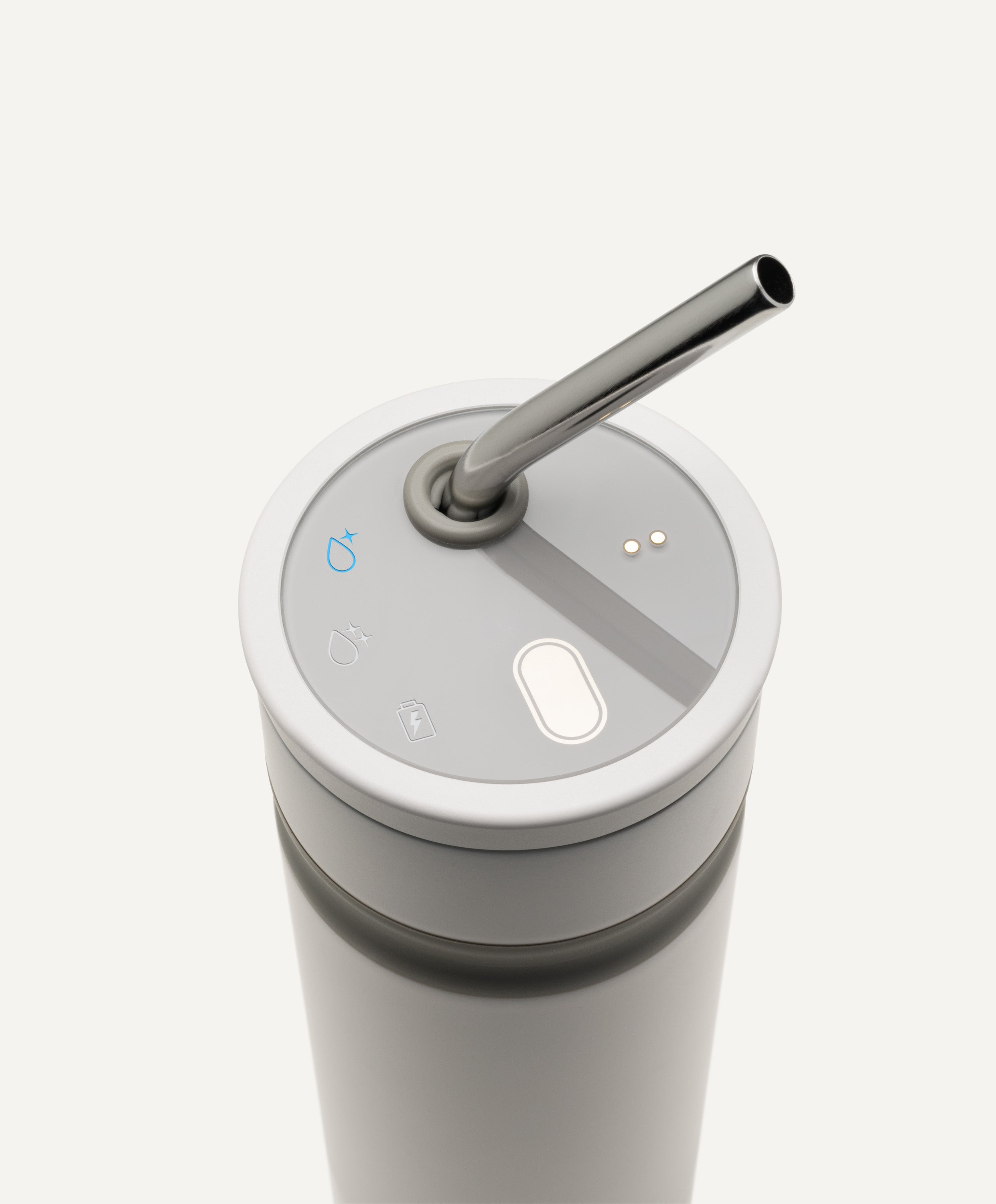 Top view of Uvio self-purifying water bottle 16 fl oz / 480 mL in Glacier white showing straw, button, and UV-C purification features that eliminate 99.9% of harmful microorganisms