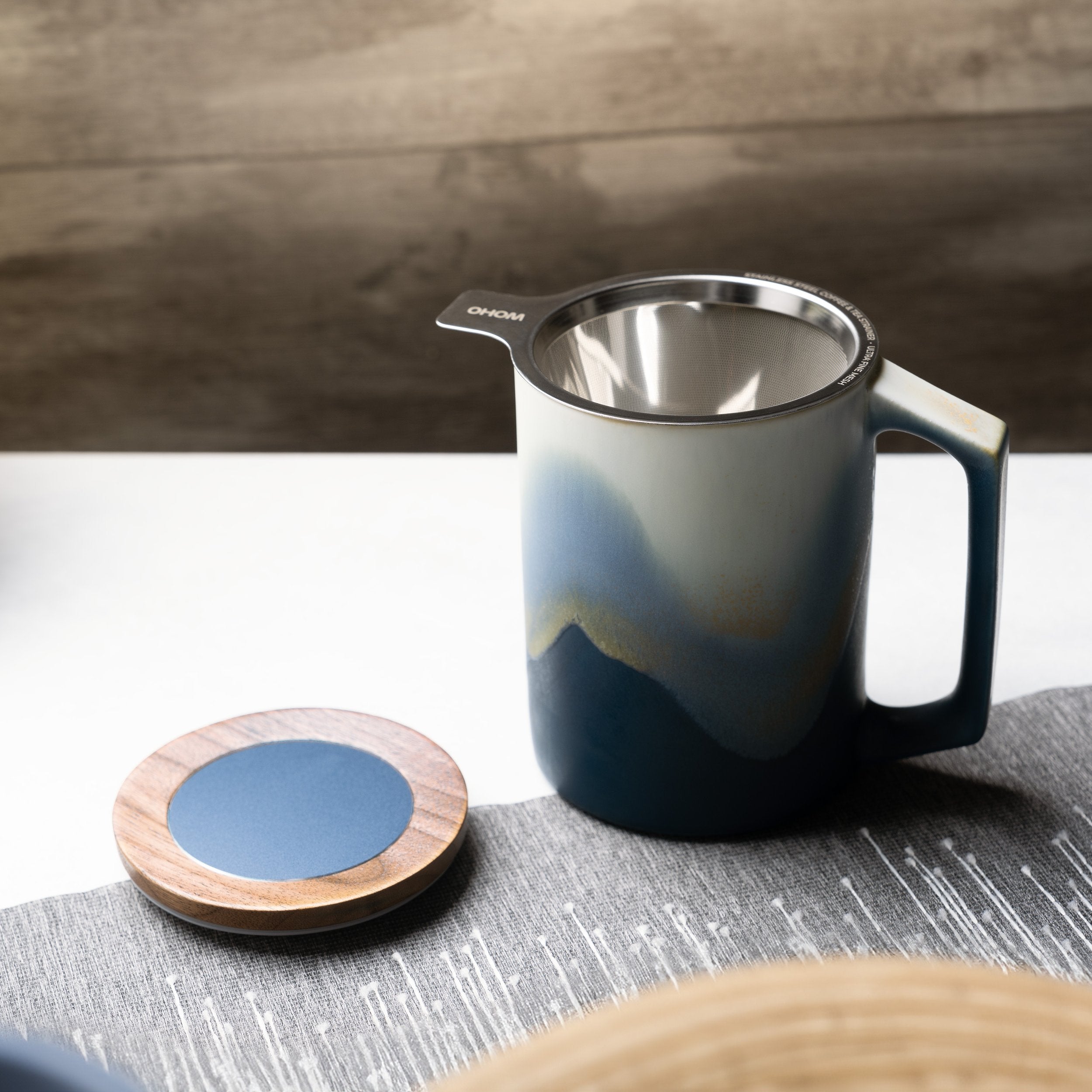 Blue Mug with design and strainer and lid