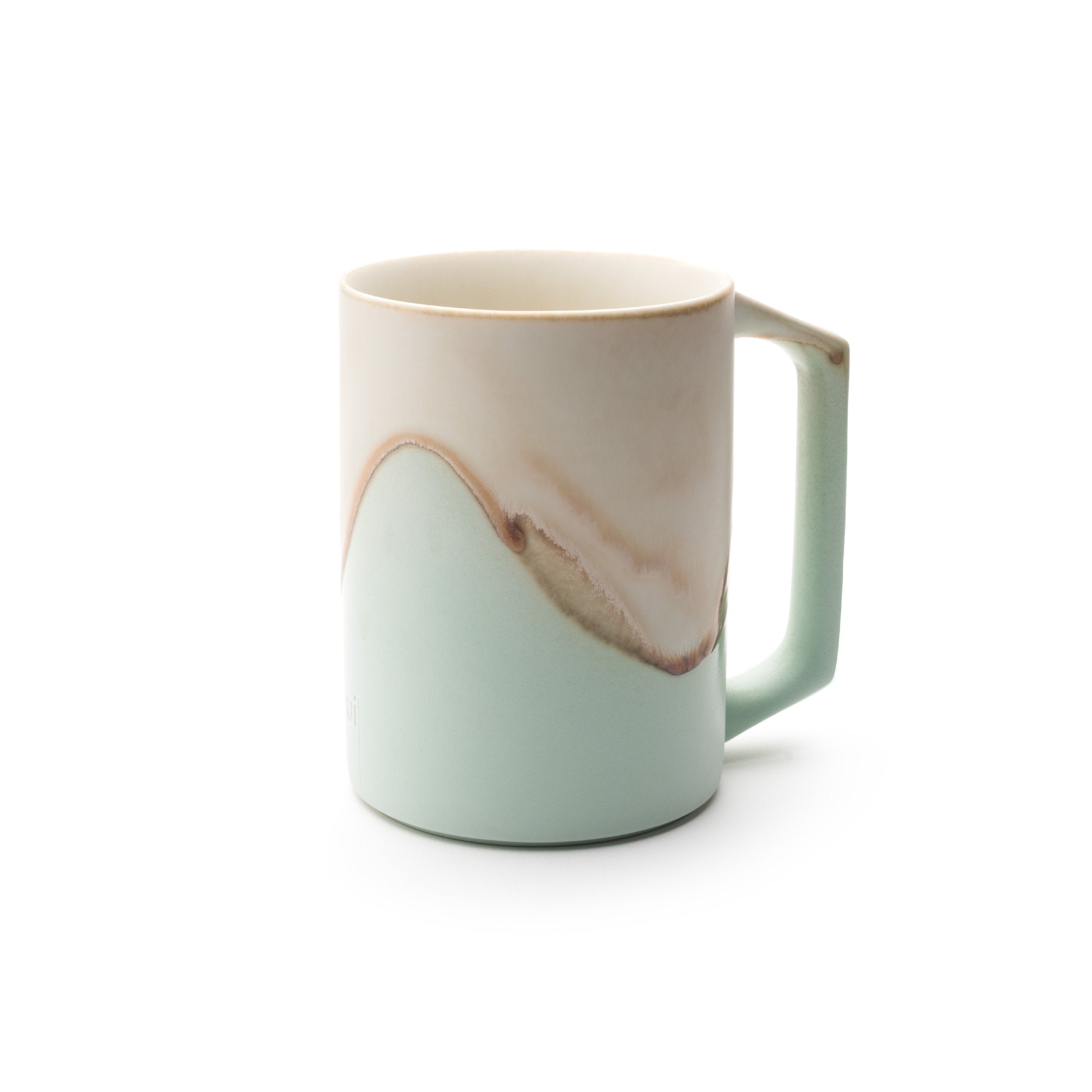Mint colored mug with design