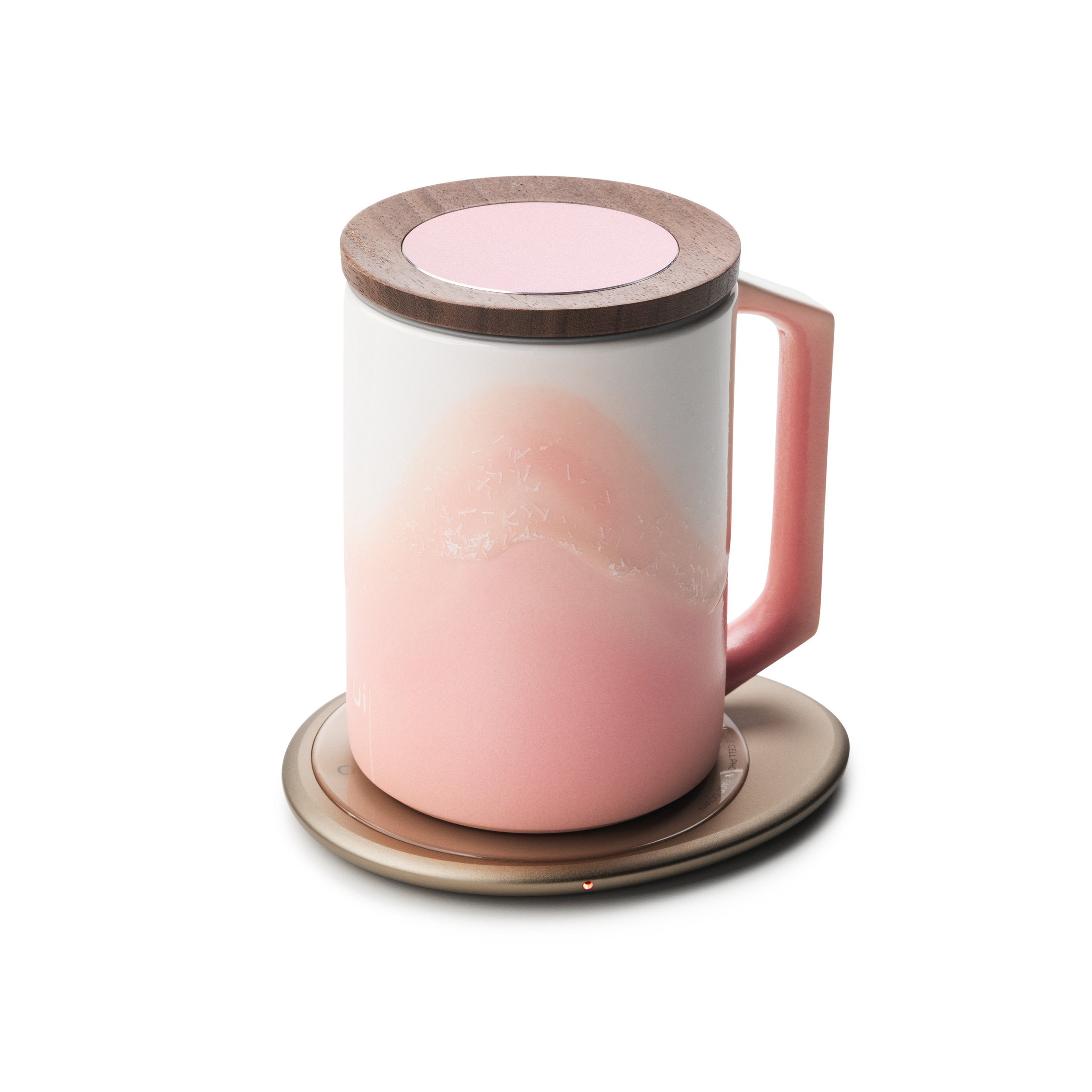 Pink mug with lid with design on pink pebble heating pad