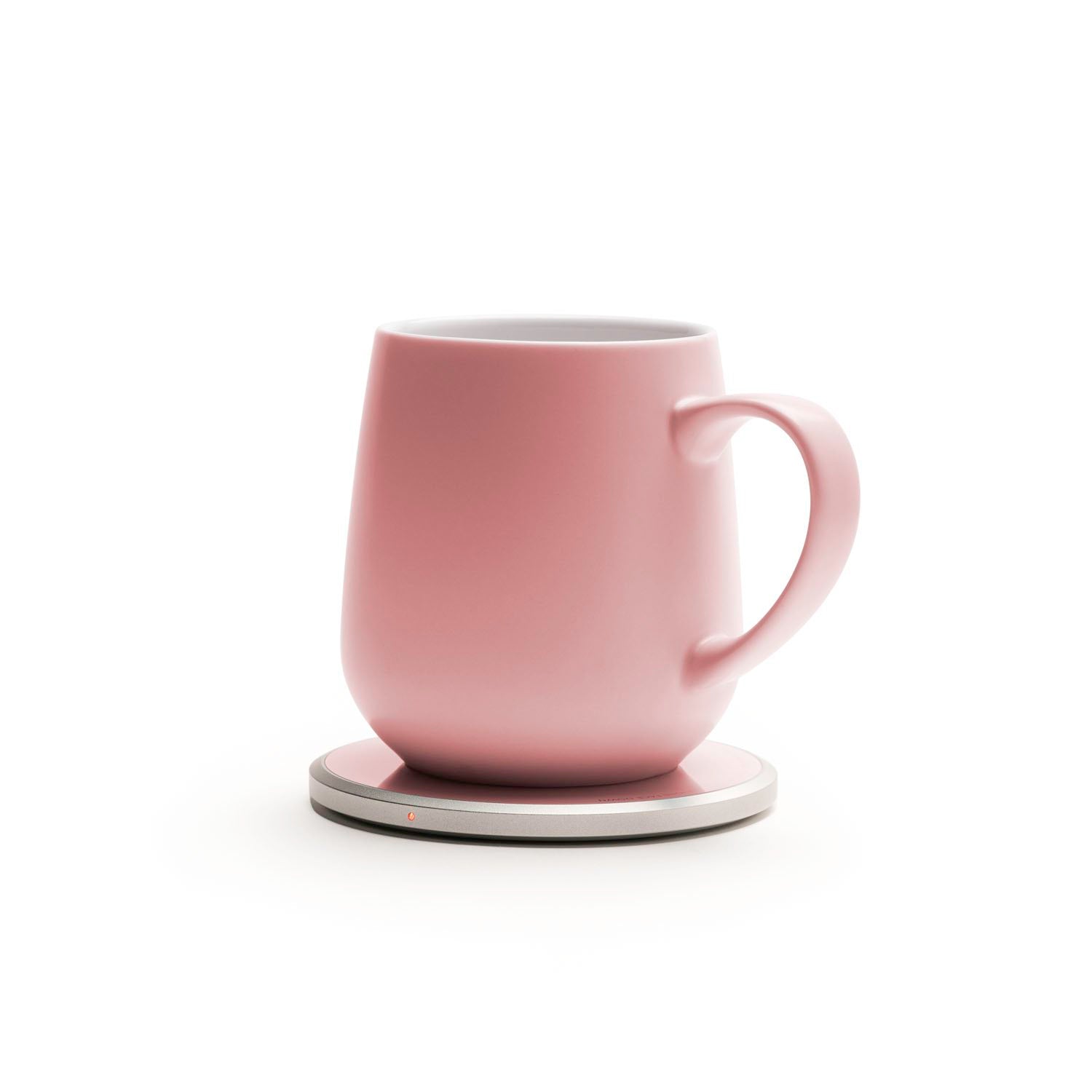 Pink mug on heating pad