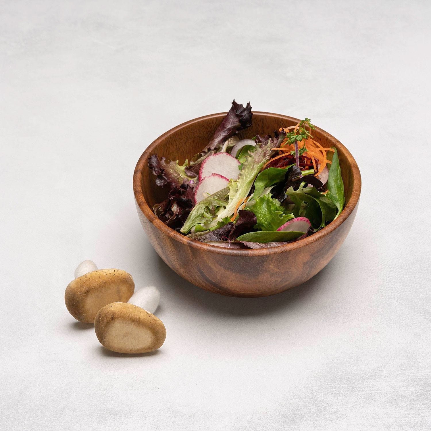 Salad in a wooden bowl
