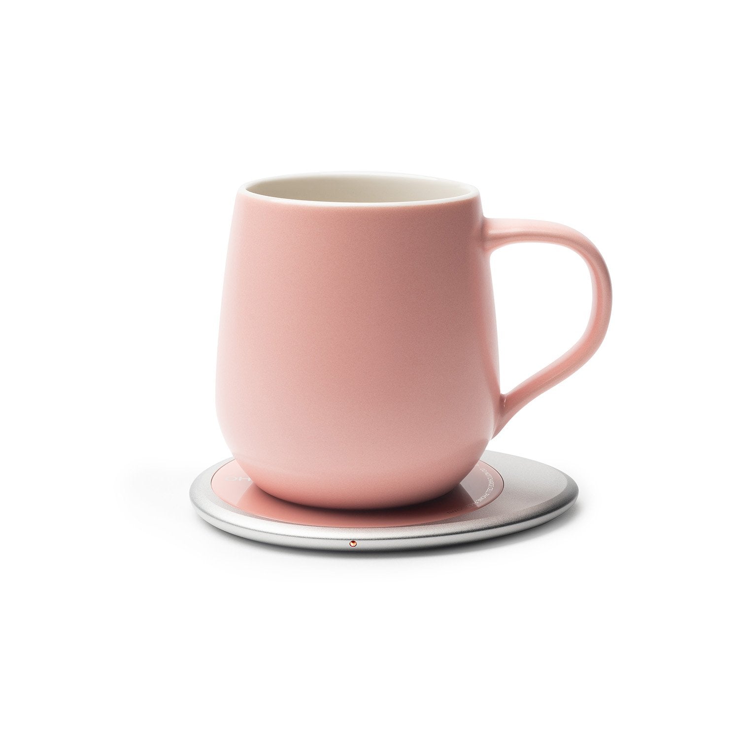 Pink mug on heating pad