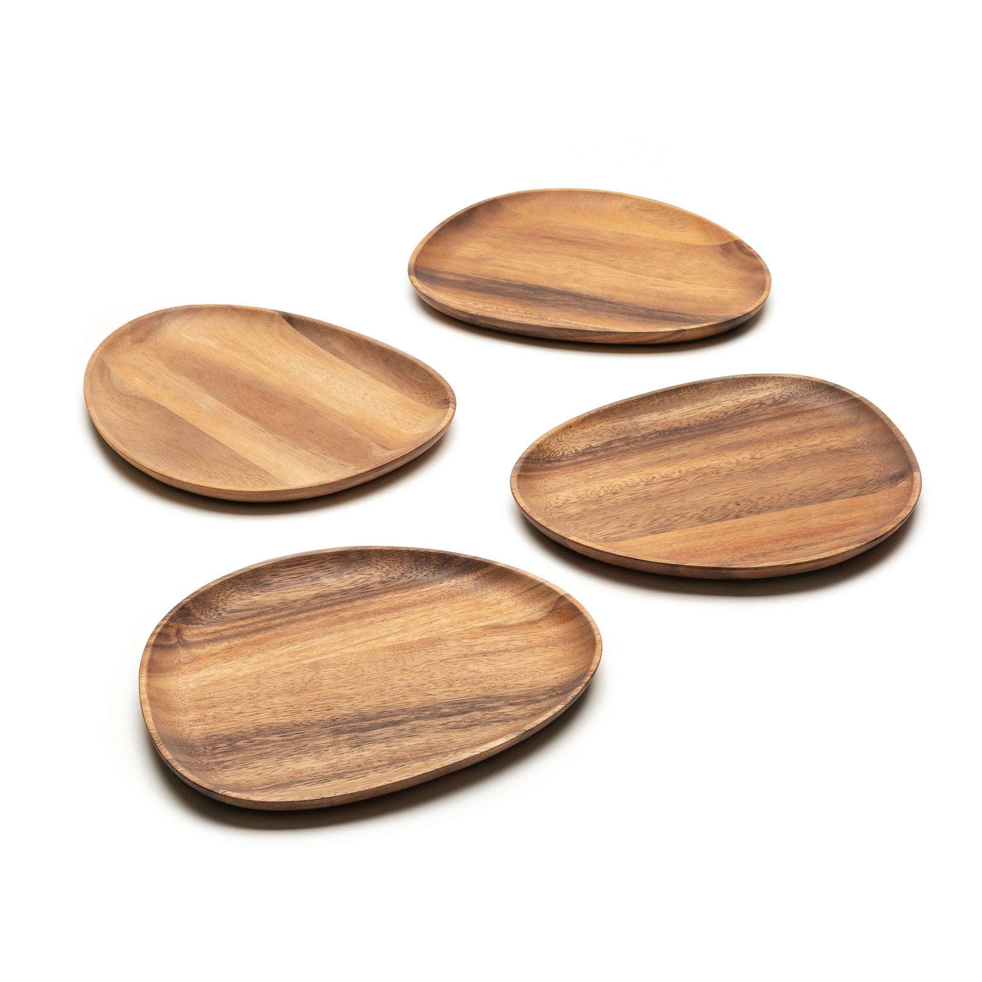 Four small wooden plates