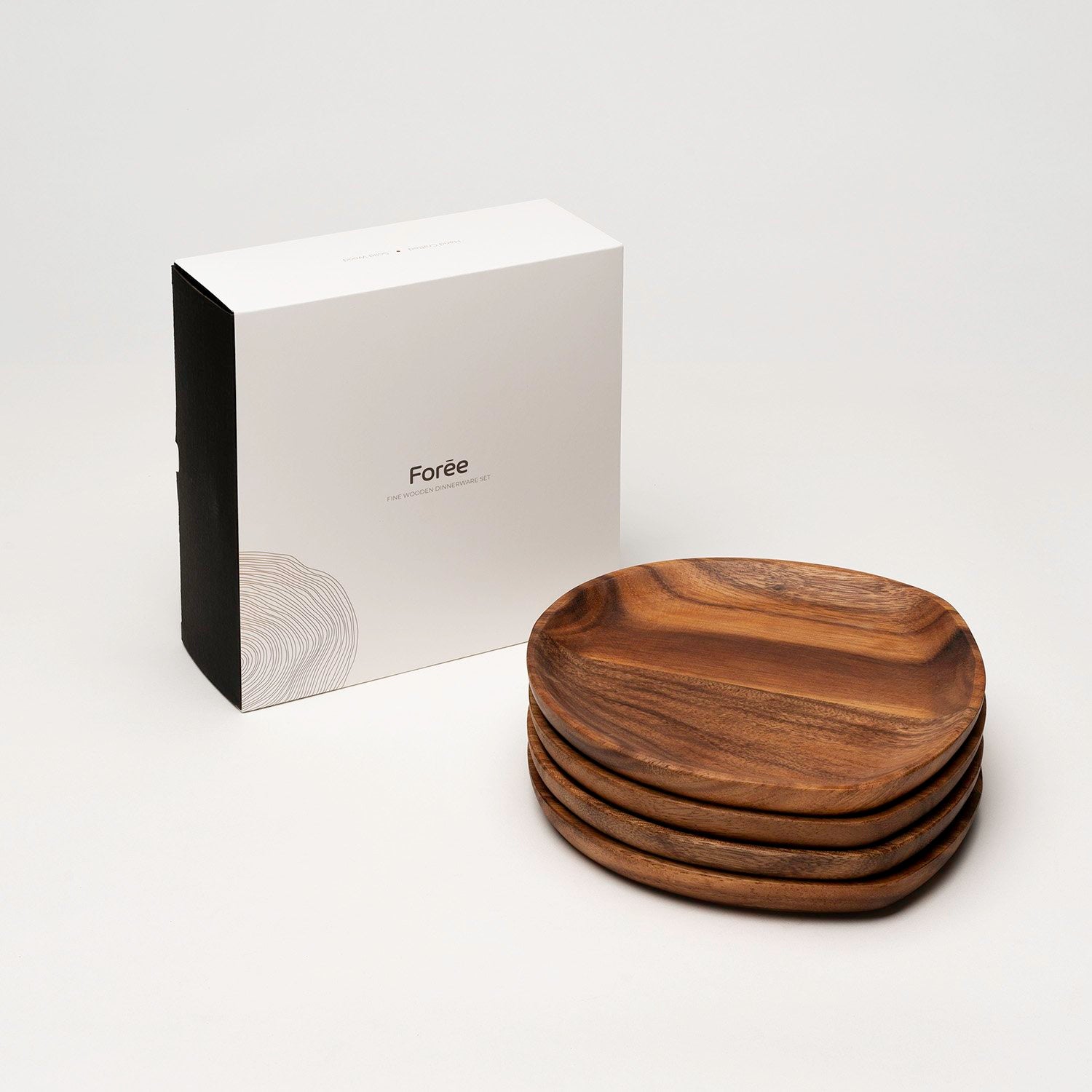 Four medium wooden plates stacked