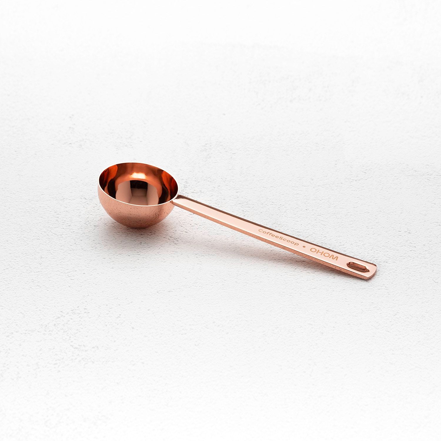 Copper colored coffee spoon