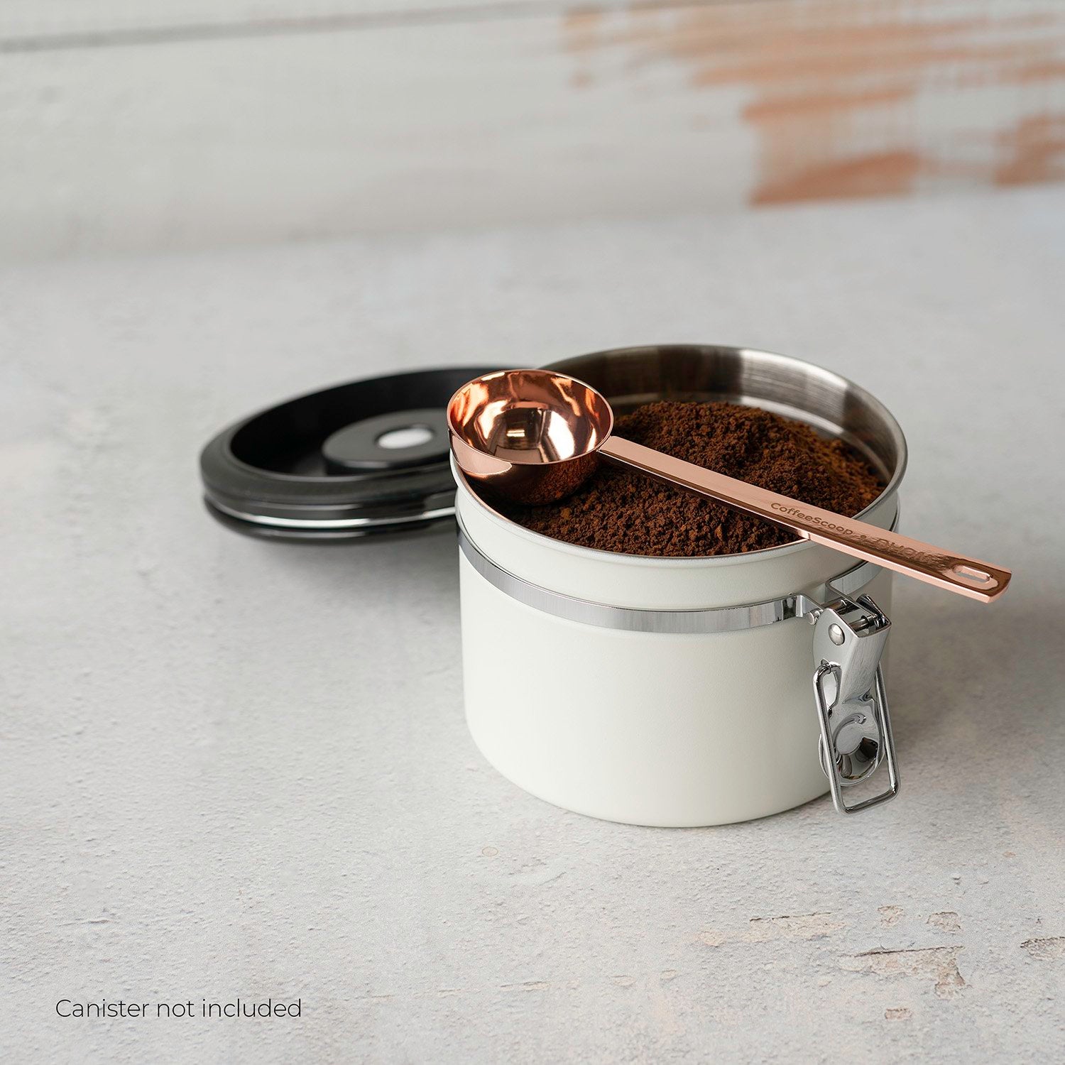 Coffee spoon on coffee canister 