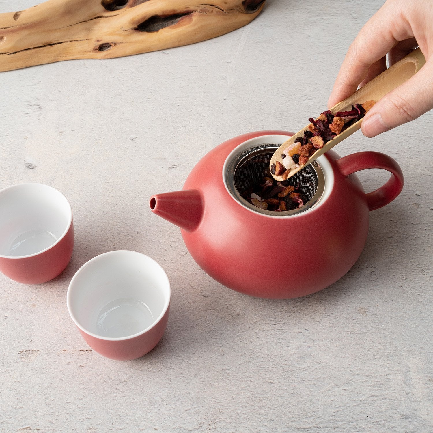 Red teapot with cups